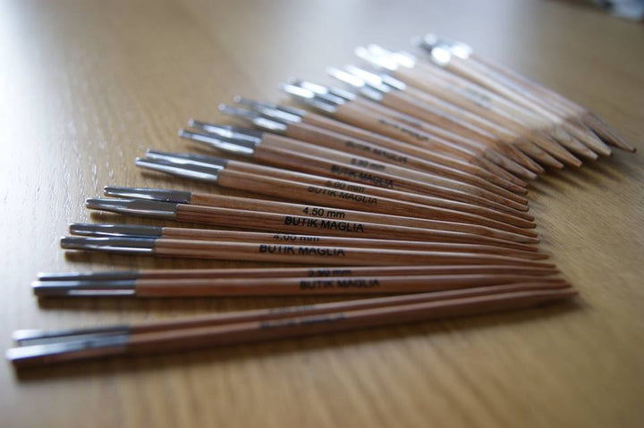 Rundst. trä m. logo 60 cm, 12,0 m - Butik Maglia